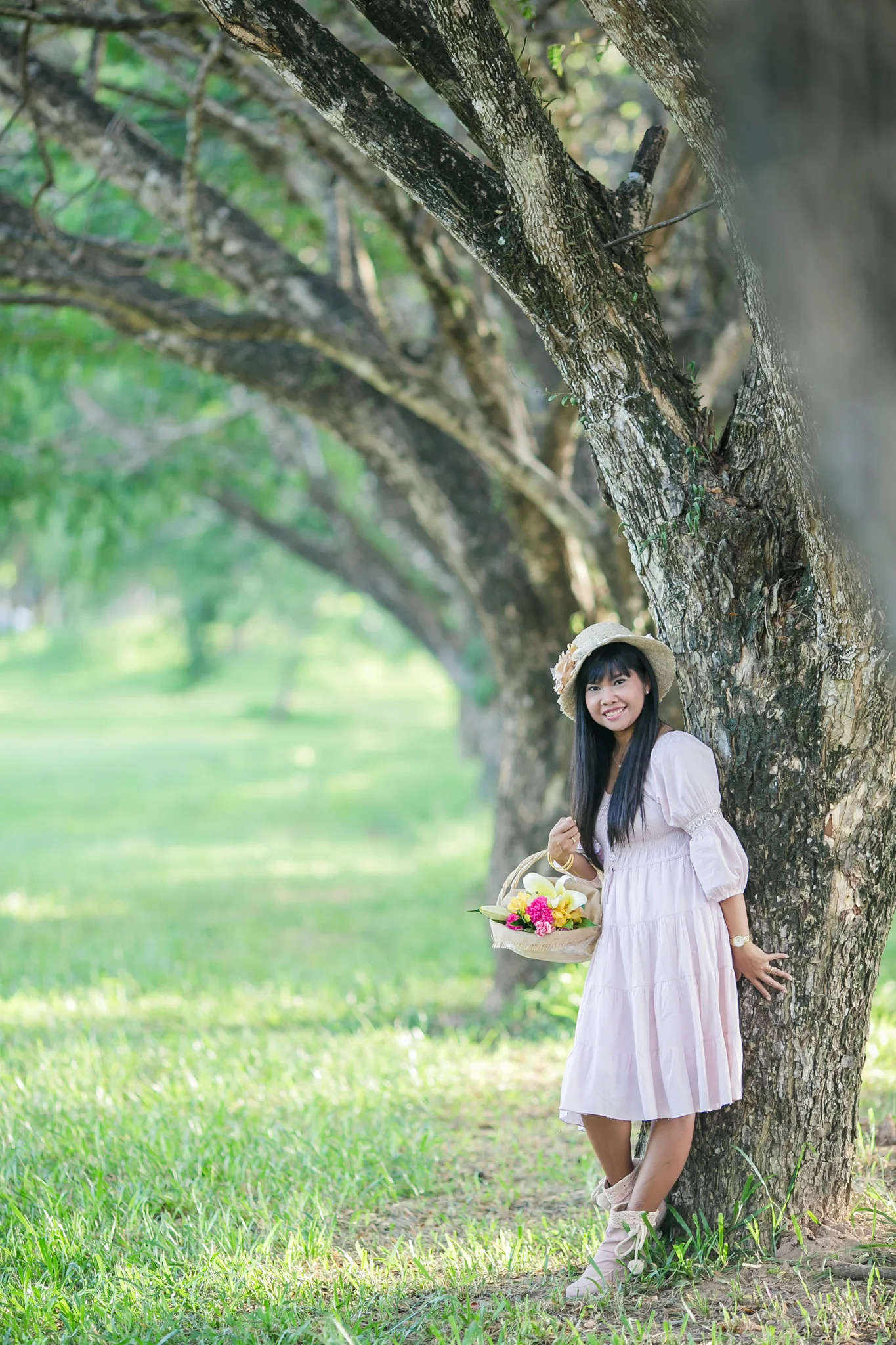 Supparin, lead floral designer at Wedding Flowers Phuket, in a studio process portrait