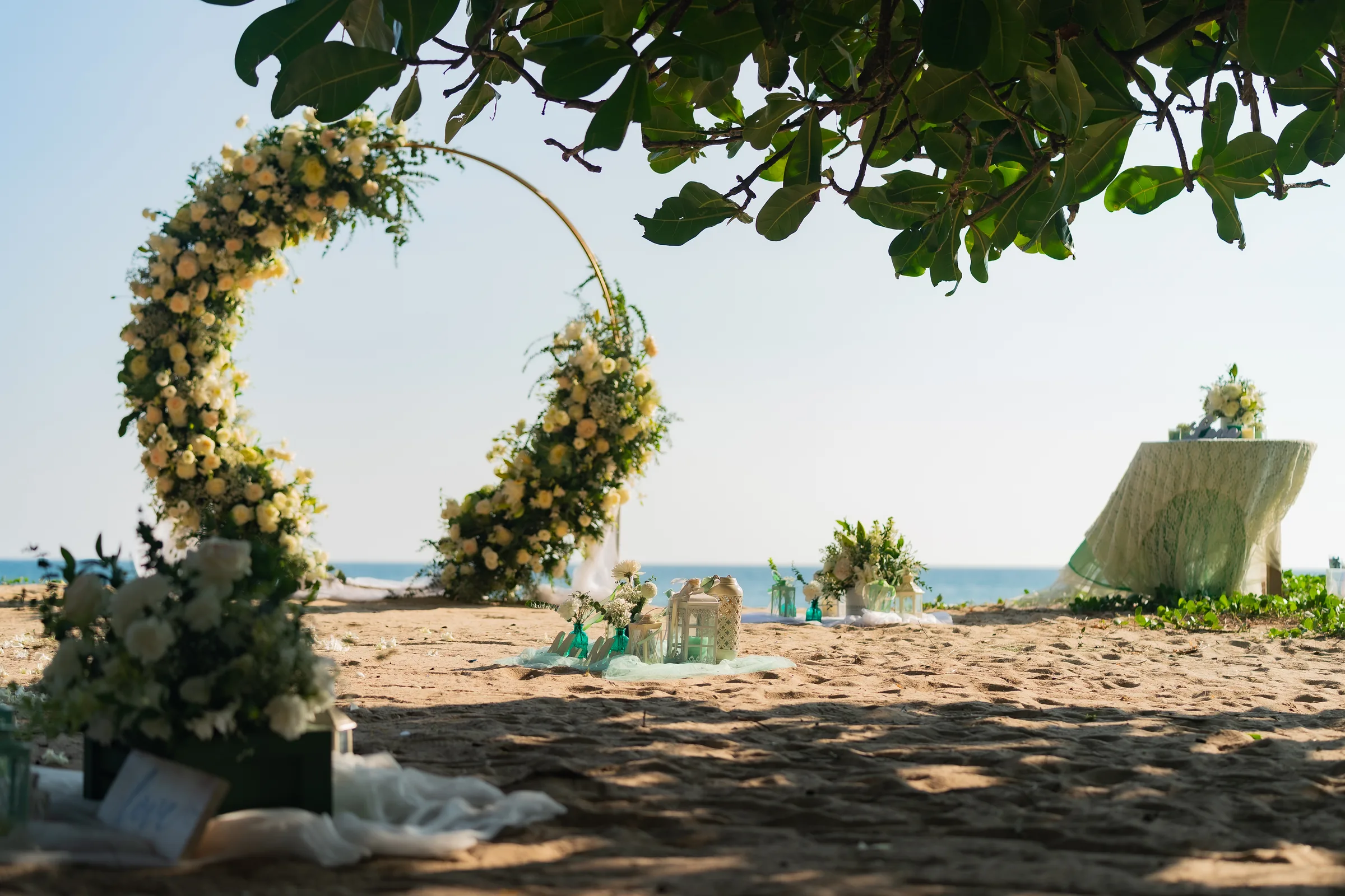 Deslie, Russell, Maureen & Peter — Beach Vow Renewal, April 2026 — Phuket wedding florals by Supparin