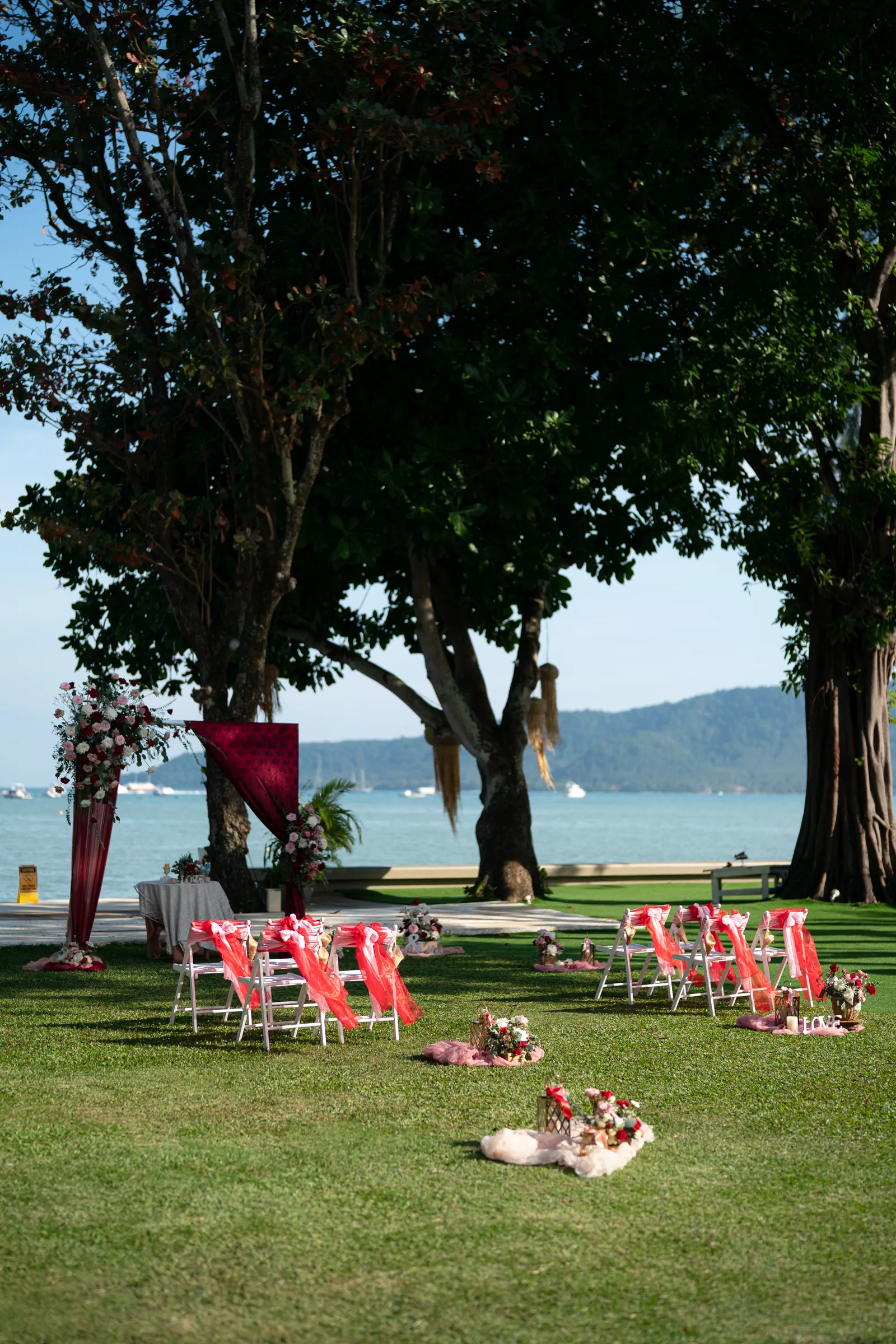 Louise & Daniel — Kan Eang Pier, December 2025 — Phuket wedding florals by Supparin