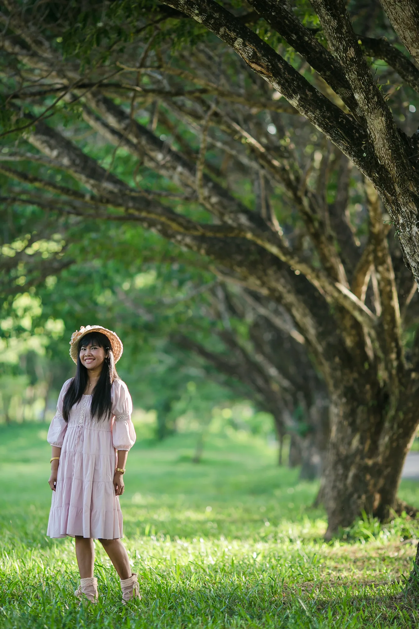 Supparin, lead floral designer at Wedding Flowers Phuket, in a studio process portrait